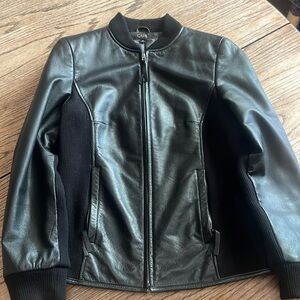Black size medium womens leather and knit jacket by Q.U.E
